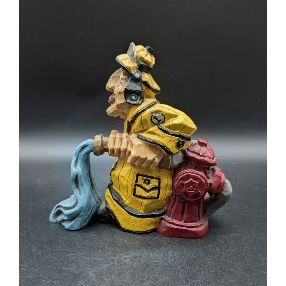 David Frykman Firefighter Figurine Whimsical Folk Art Fireman with Hydrant